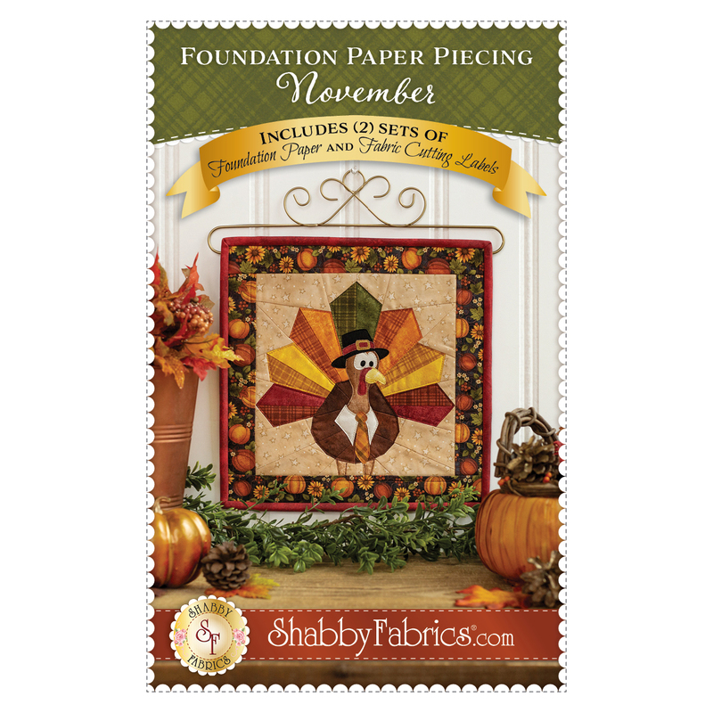 front cover of the foundation paper piecing pattern for November featuring a finished project with a turkey on it with the title and designer info