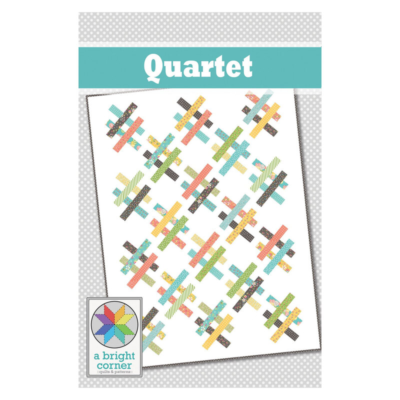 Front of the Quartet pattern, showcasing a finished white quilt with multicolor crosshatching