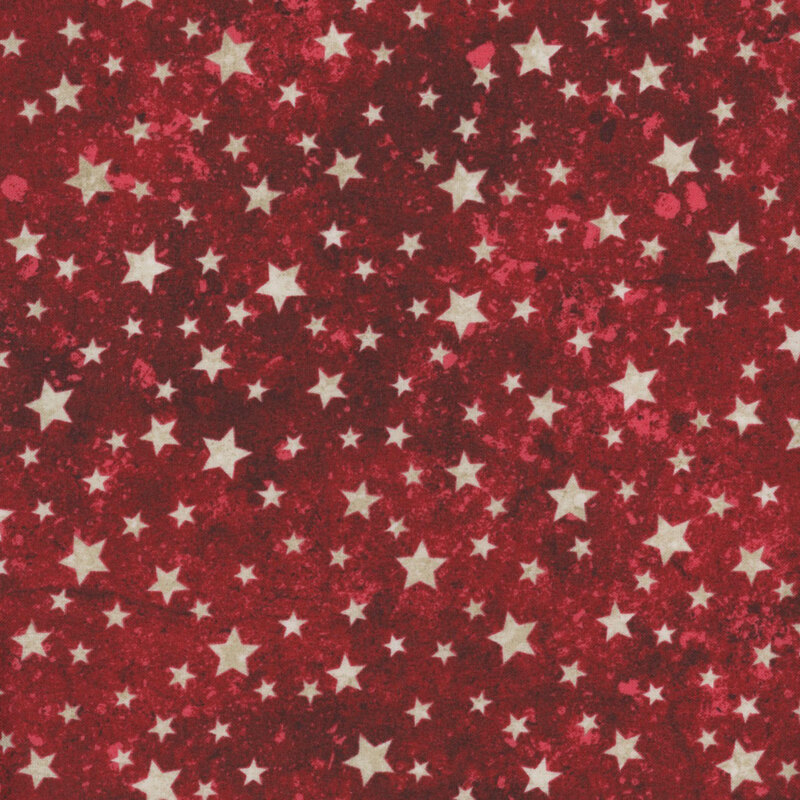 Light tan stars tossed onto a mottled and tonal wine red background