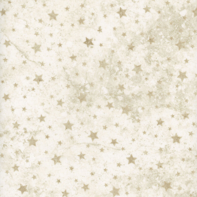 Tan tossed stars on a mottled and tonal light beige or cream background