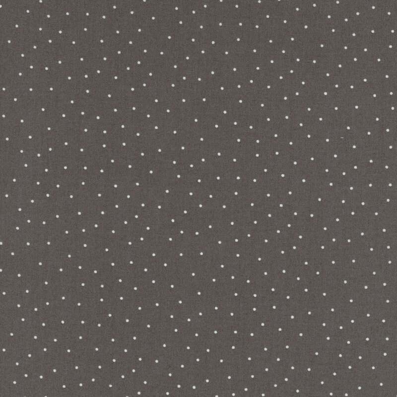fabric featuring a gray background with scattered small white dots