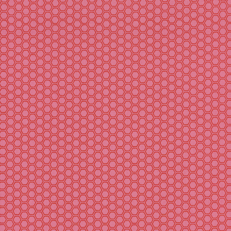 pink fabric featuring a red honeycomb texture