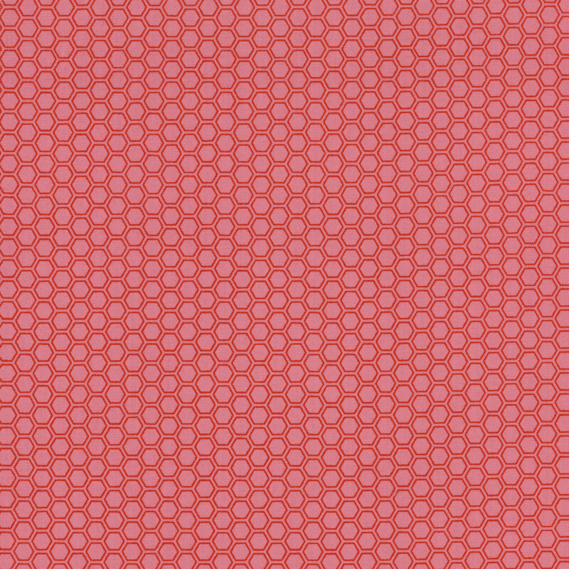 pink fabric featuring a red honeycomb texture