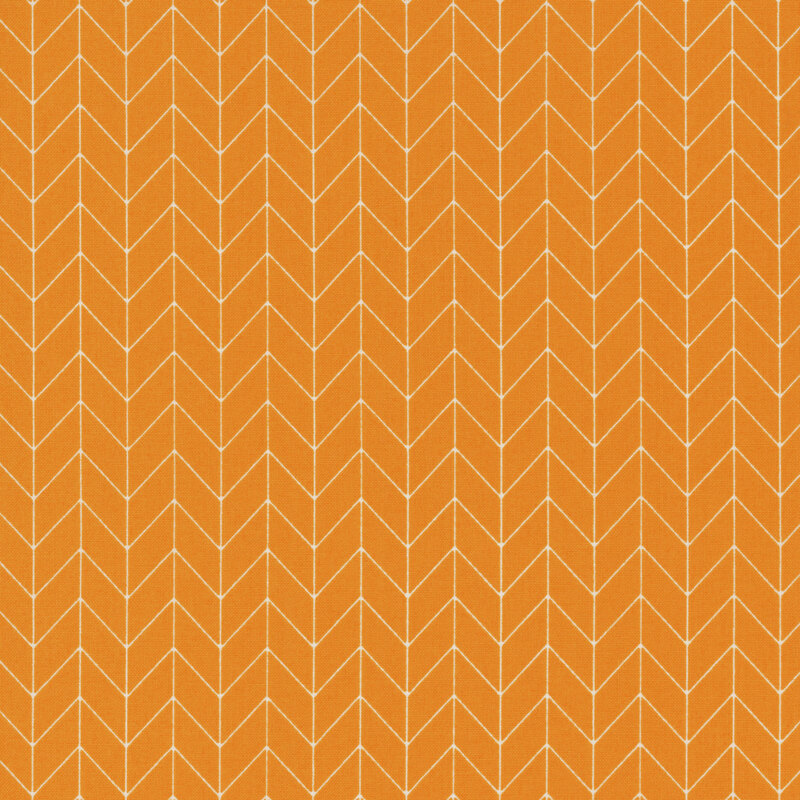 orange fabric featuring a white chevron pattern