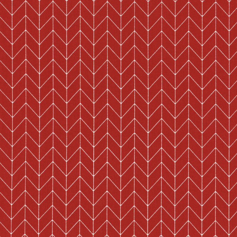 red fabric featuring a white chevron pattern