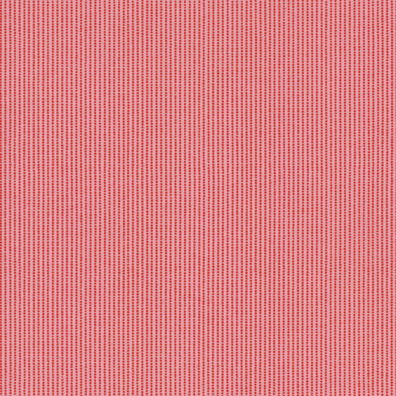 pink fabric featuring red dotted stripes