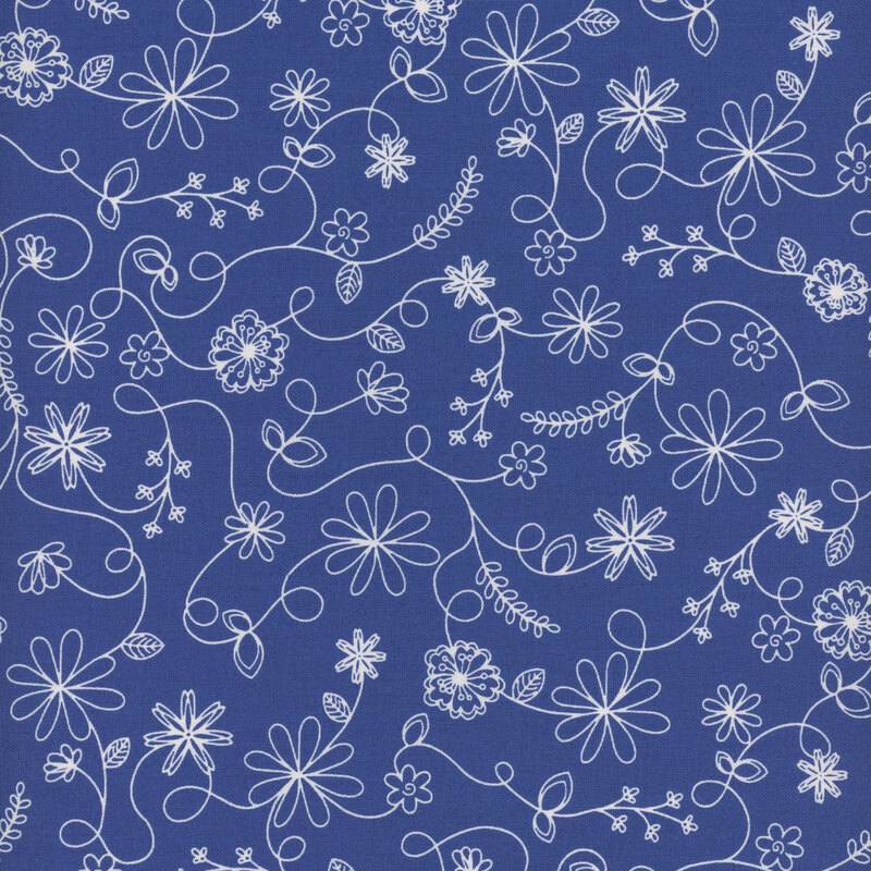 royal blue fabric featuring a swirling vine floral pattern in white