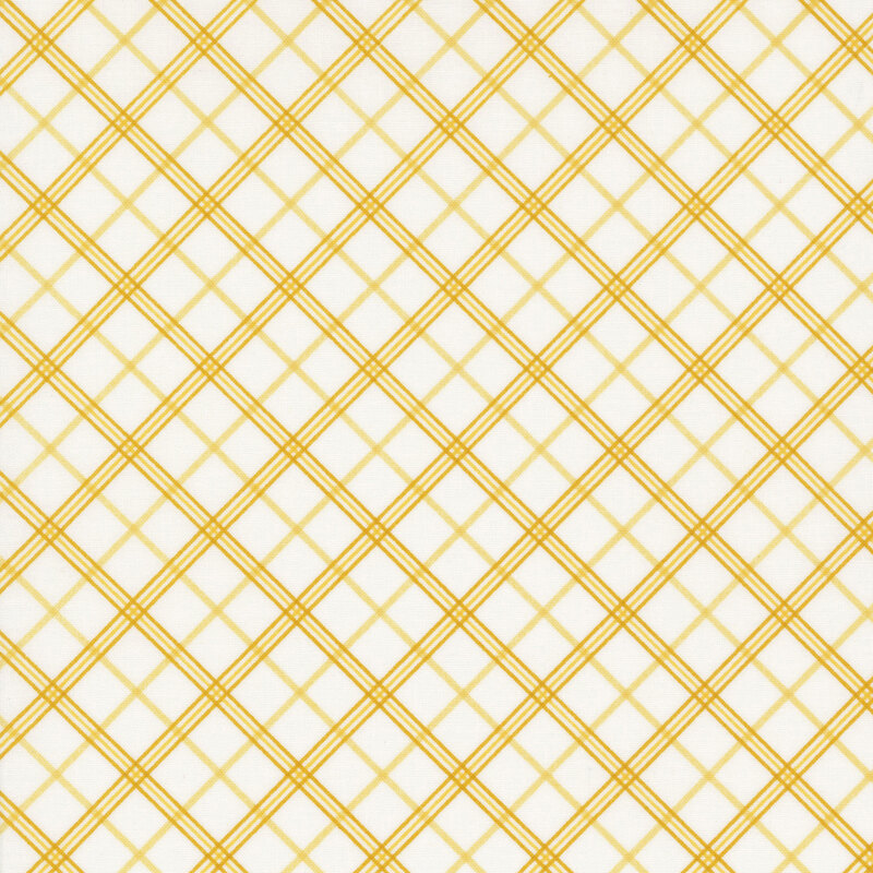 white fabric featuring diagonal yellow plaid in three different shades