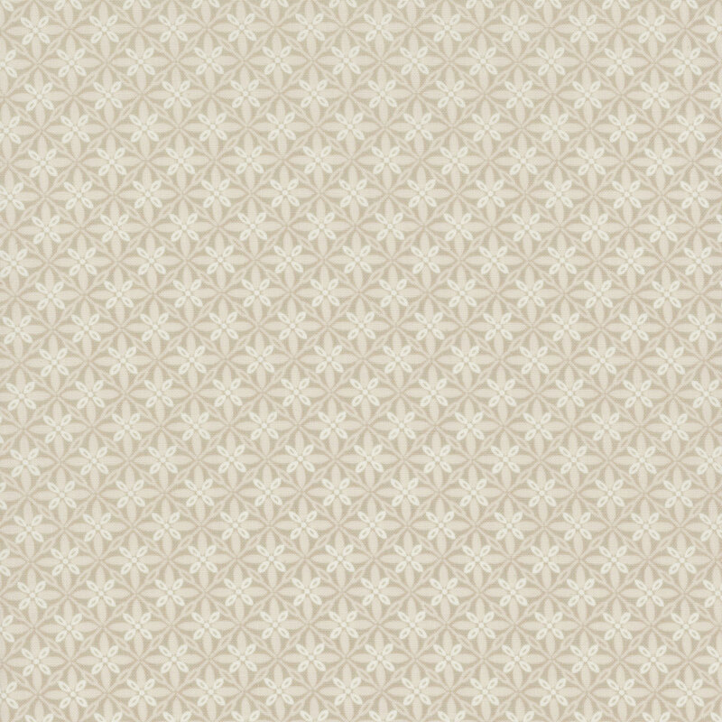 lovely taupe fabric featuring a geometric tuft design in lighter shades of cream
