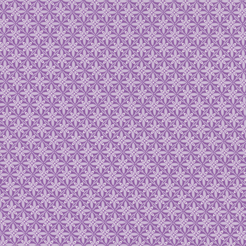 lovely purple fabric featuring a geometric tuft design in lighter shades of purple