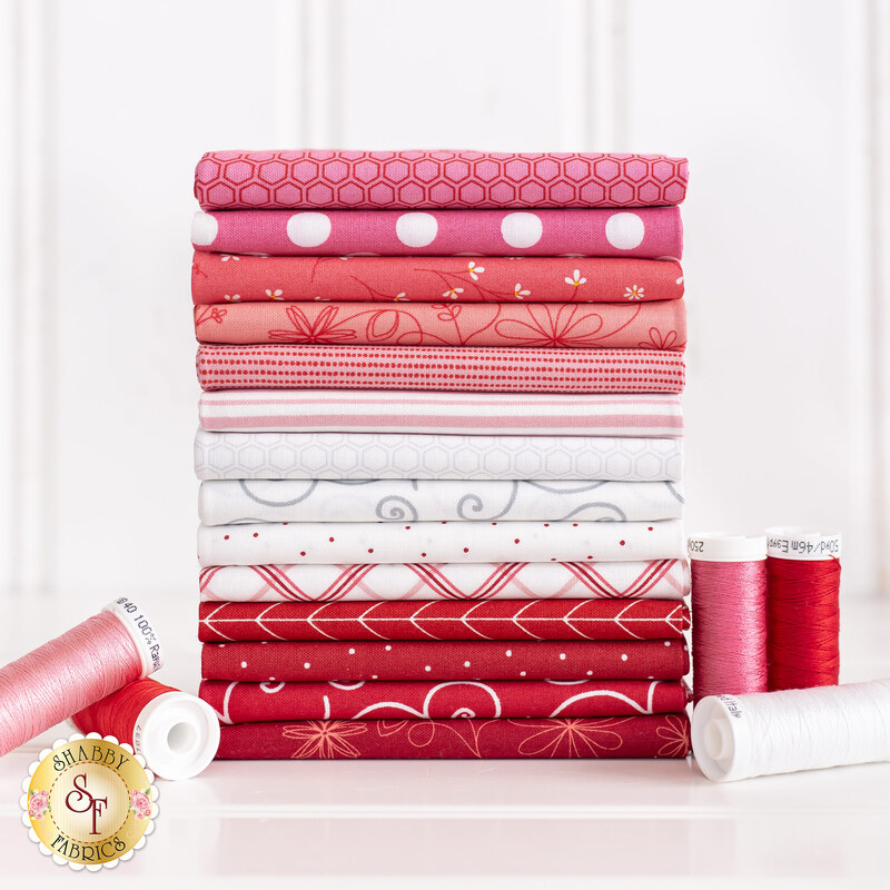 photo of 14 FQ fabric stack of kimberbell basics refreshed be mine in pink, red, and white