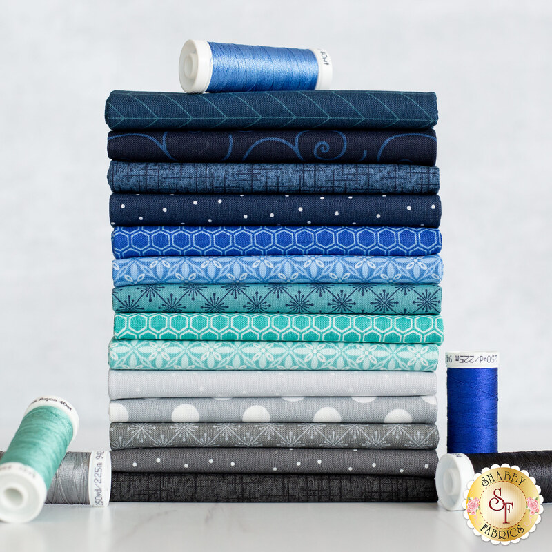 photo of 14 FQ fabric stack of kimberbell basics refreshed maritime in blue, gray, and aqua