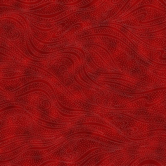 red fabric featuring darker mottling, with speckles and flowing scrolling and swirls