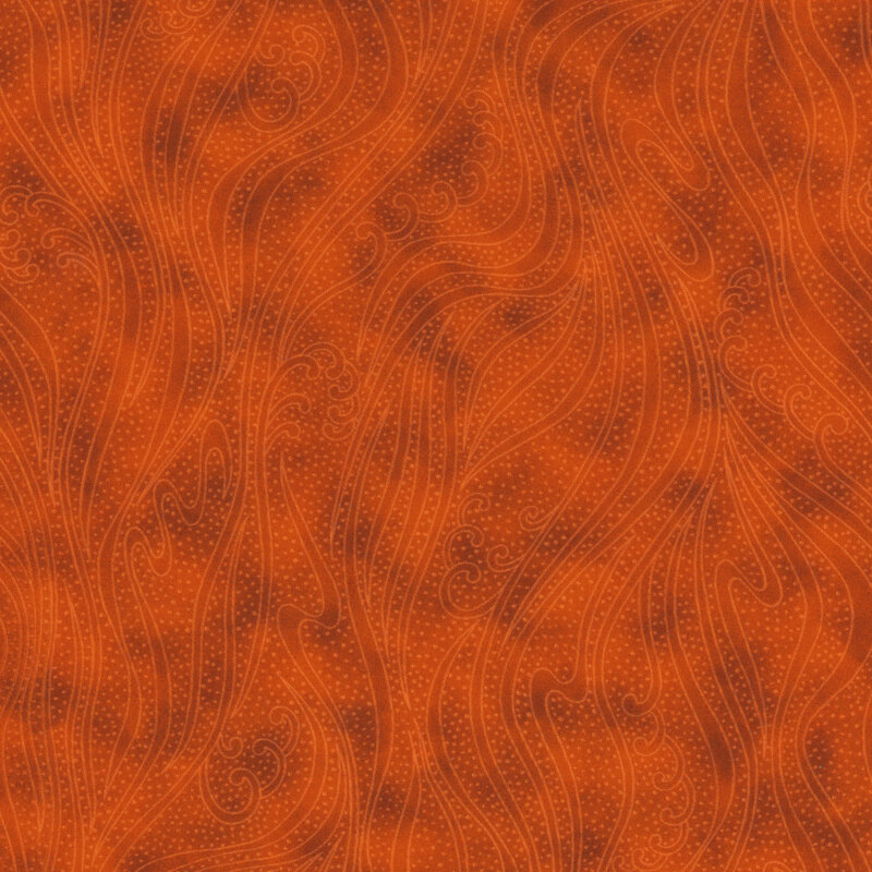lovely orange fabric featuring darker mottling, with speckles and flowing scrolling and swirls