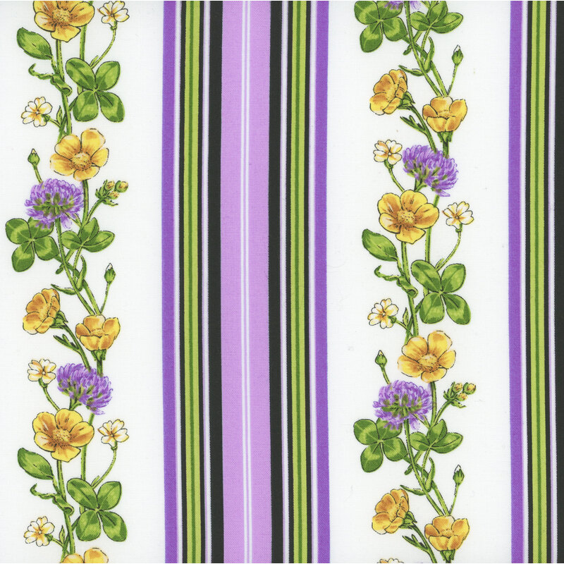 white striped fabric featuring strips of flowers and four-leaf clovers, with stripes in shades of purple and green in between