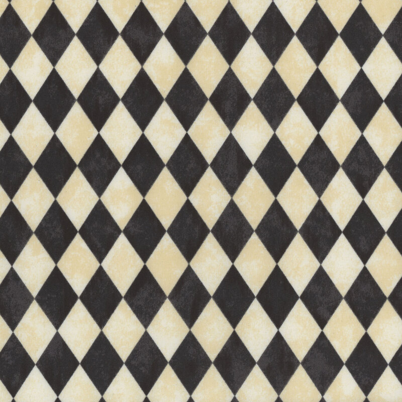 black and cream mottled fabric featuring a harlequin design of elongated diamonds