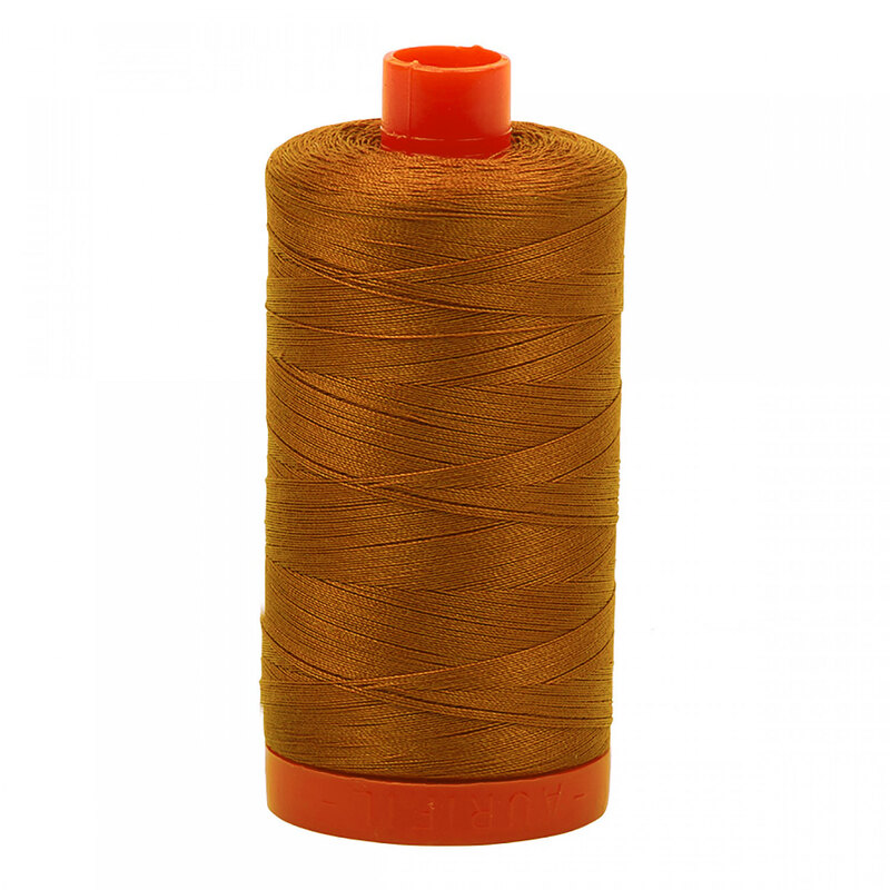A spool of Aurifil 2155 - Cinnamon thread on a white background