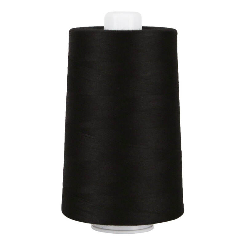 Large spool of black thread on a white background