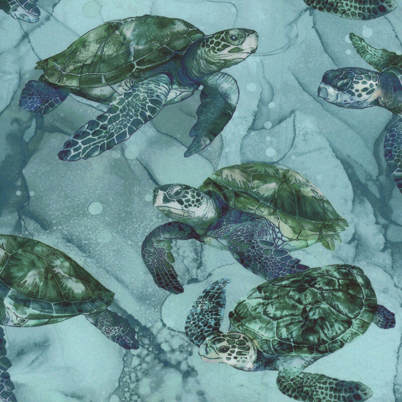 Digitally printed fabric with blue, aqua and green mottling with sea turtles swimming through the illusion of water.