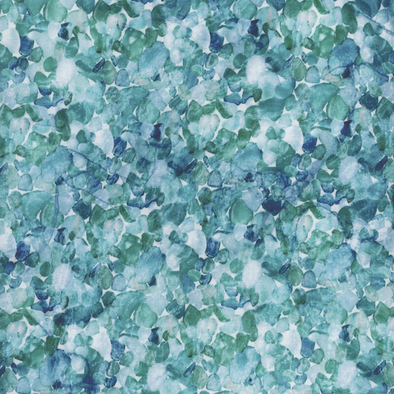 Speckled, mottled blue, white, and aqua fabric