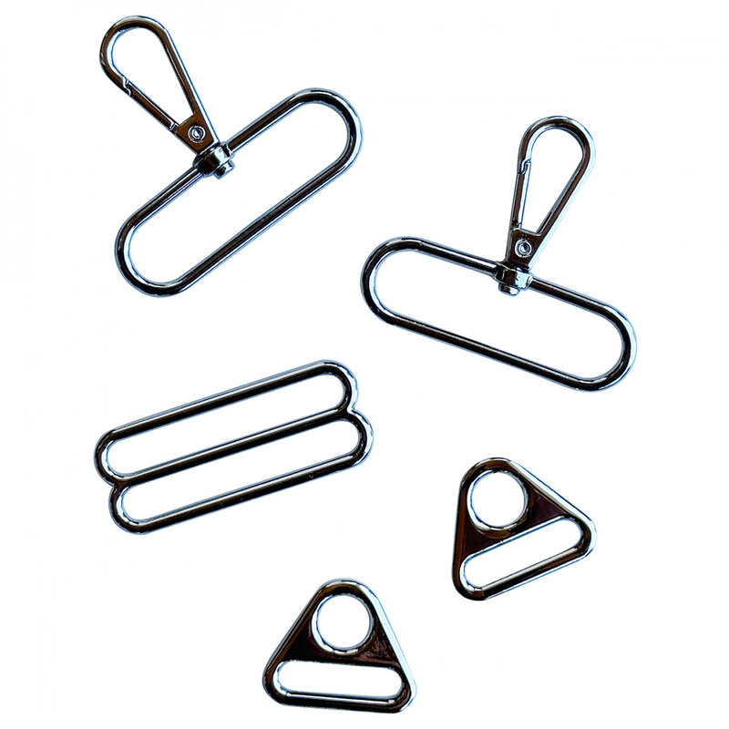 Photo of 2 nickel swivel hooks, 2 nickel triangle rings, and 1 nickel handle slide
