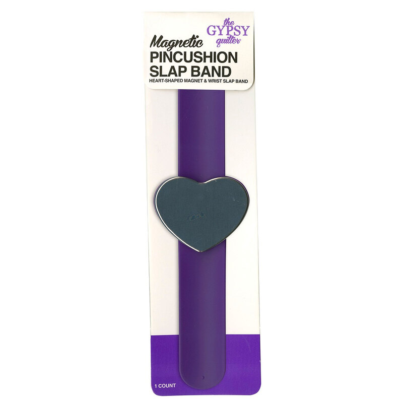 purple slap band with silver magnetic heart in packaging on a white background