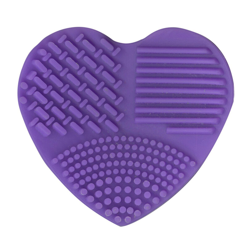 purple silicone heart cutting mat scrubber on a white background