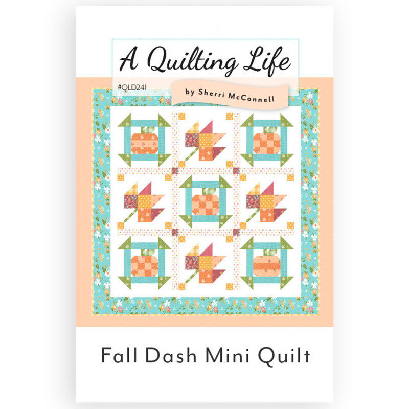 The front of the Fall Dash Mini Quilt pattern showing the finished quilt with leaves and pumpkin blocks
