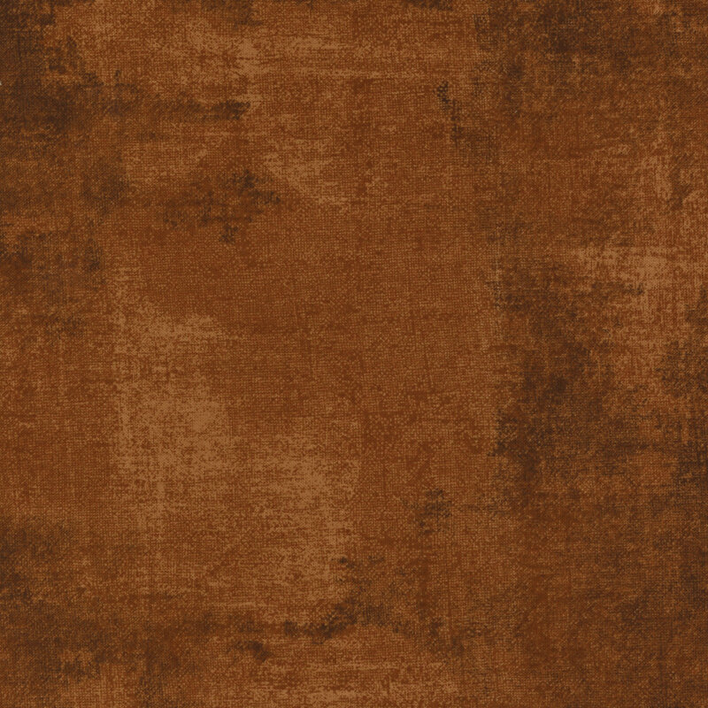 warm brown fabric featuring darker brown dry-brushed texturing