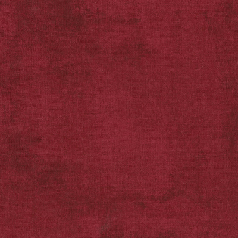 brilliant burgundy fabric featuring wine red dry-brushed texturing