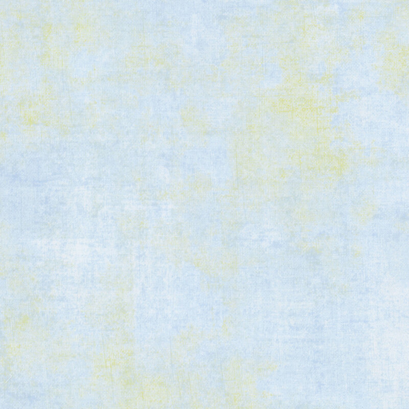 light blue fabric featuring darker blue and pear green dry-brushed texturing
