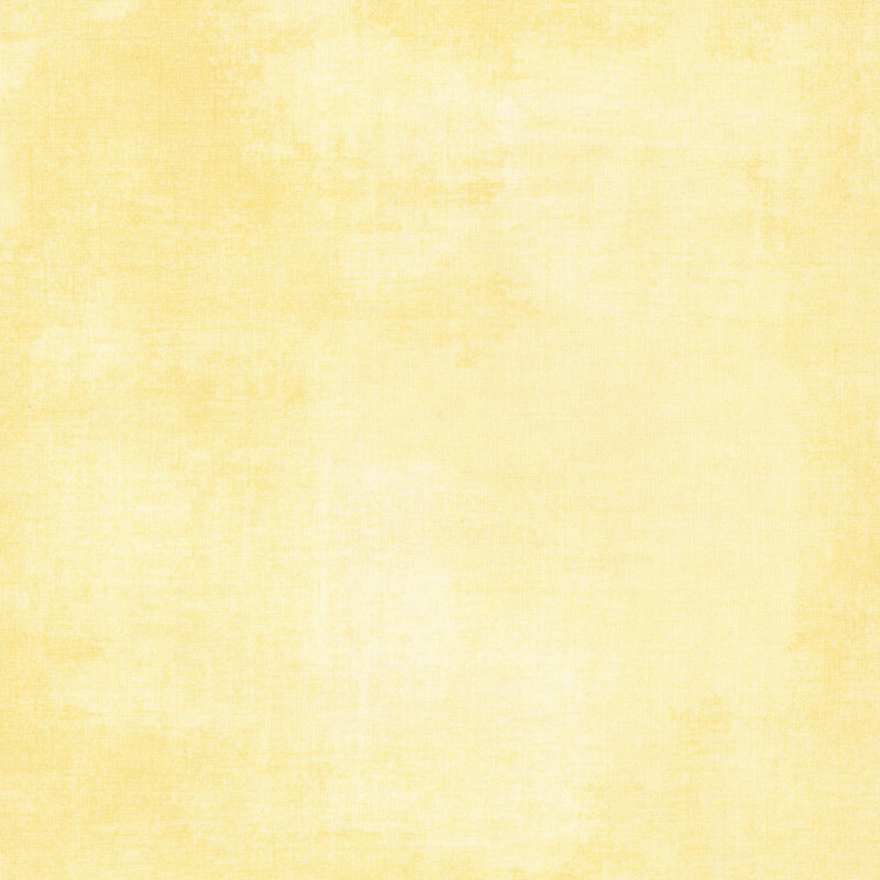soft yellow fabric featuring buttercup yellow dry-brushed texturing
