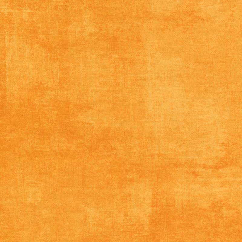 brilliant golden orange fabric featuring deeper orange dry-brushed texturing