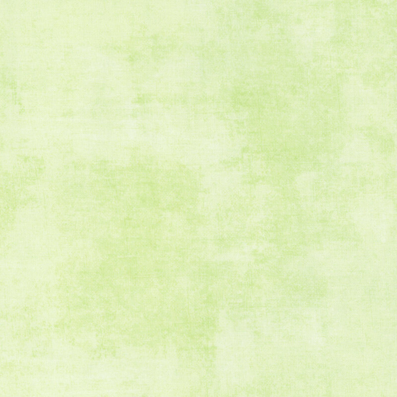 pastel green fabric featuring soft green dry-brushed texturing