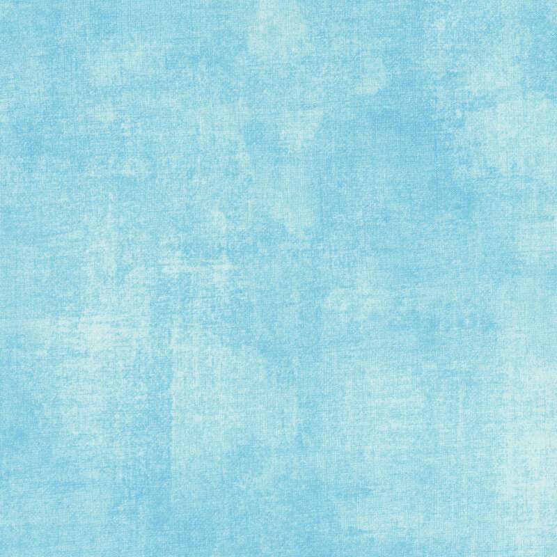 vivid cyan fabric featuring sky blue dry-brushed texturing