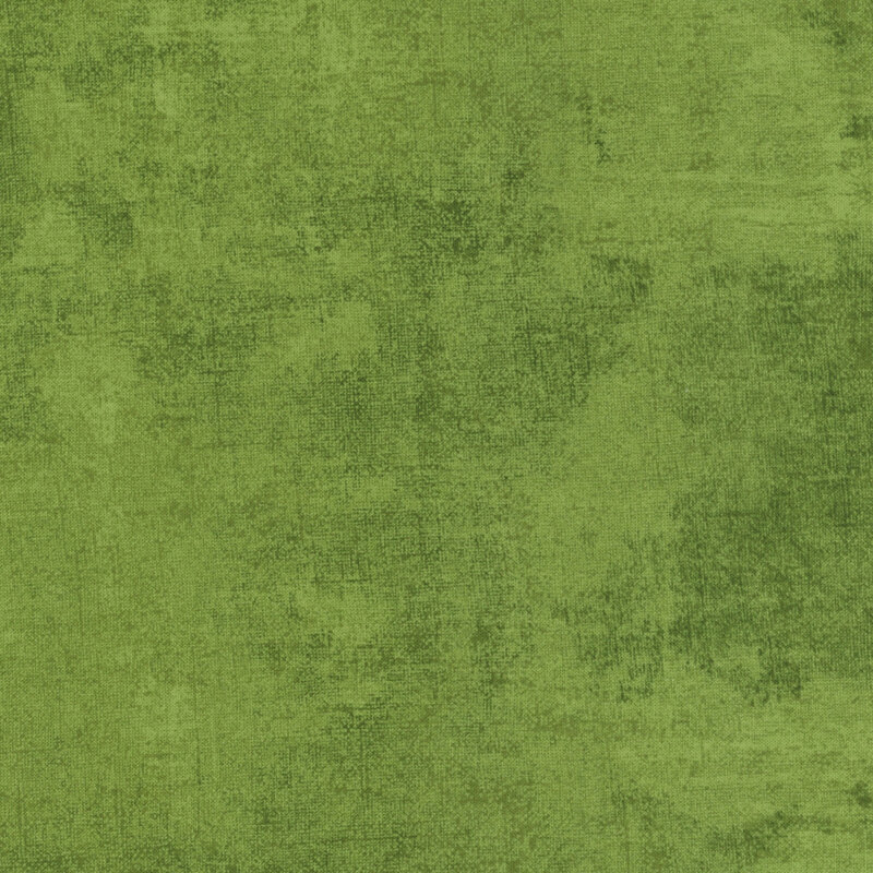 muted apple green fabric featuring dark green dry-brushed texturing