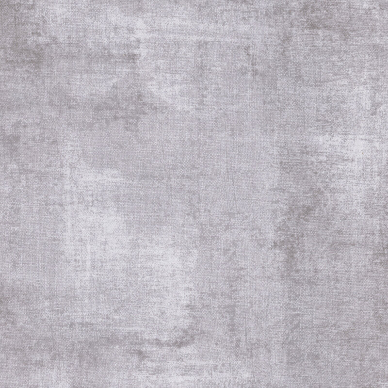 warm gray fabric featuring darker gray dry-brushed texturing
