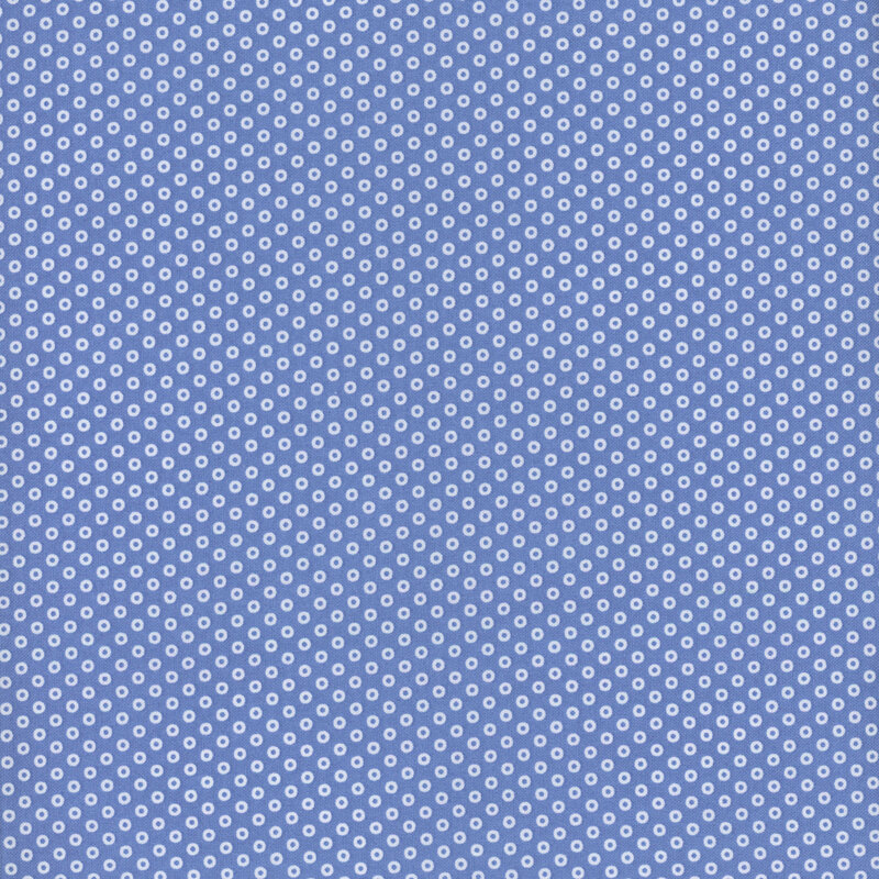 White hollow polka dots on a cobalt blue background