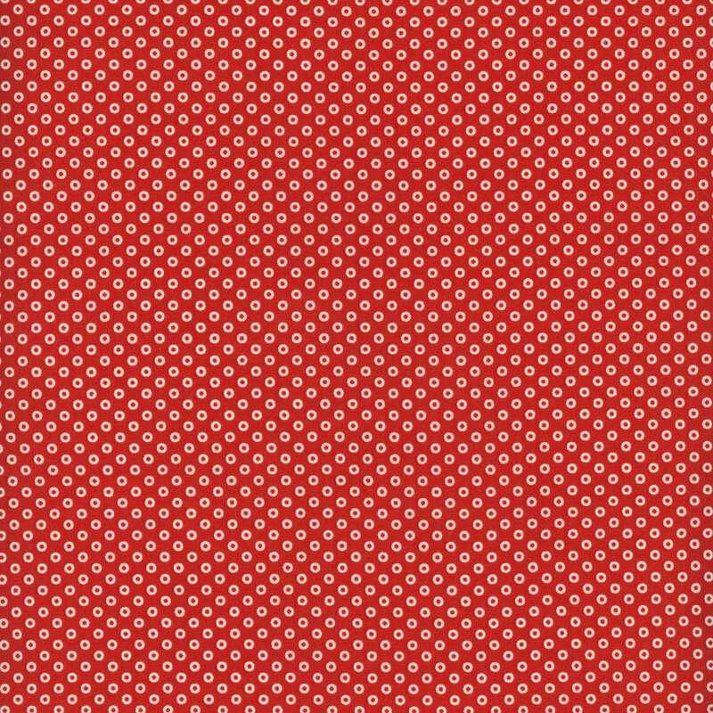 White hollow polka dots on a primary red background