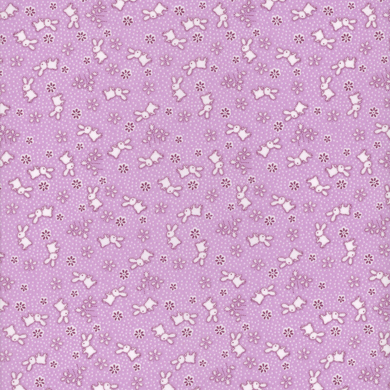 Ditsy print of little white fluffy bunnies on a violet background, tossed with flowers and polka dots.