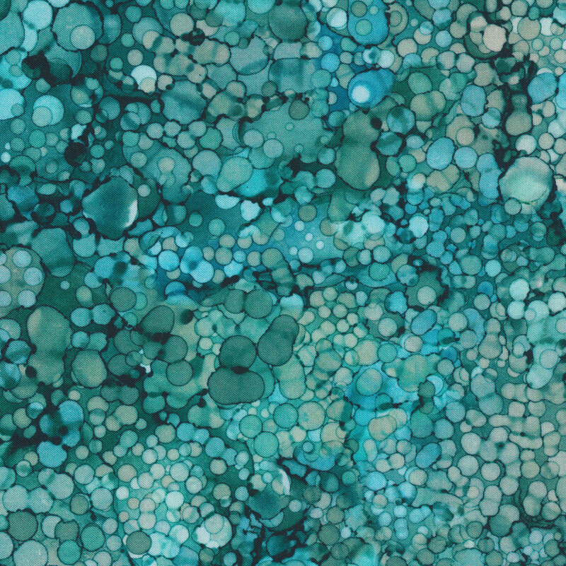 wide teal fabric featuring dark teal mottling and circles