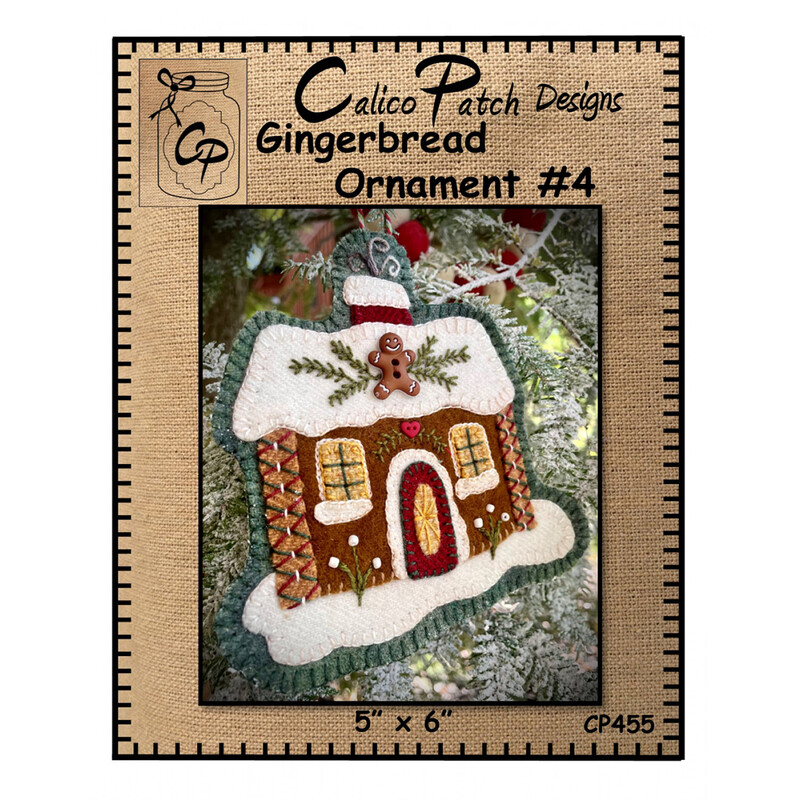 The front of the Gingerbread Ornament #4 pattern showing the finished ornament with 2 glowing windows and a gingerbread man button on a the snowy roof, staged on a christmas tree!