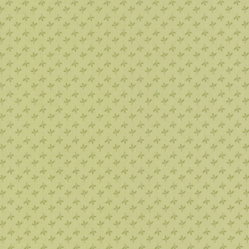 Swatch of jade green fabric with alternating rows of tonal leaves
