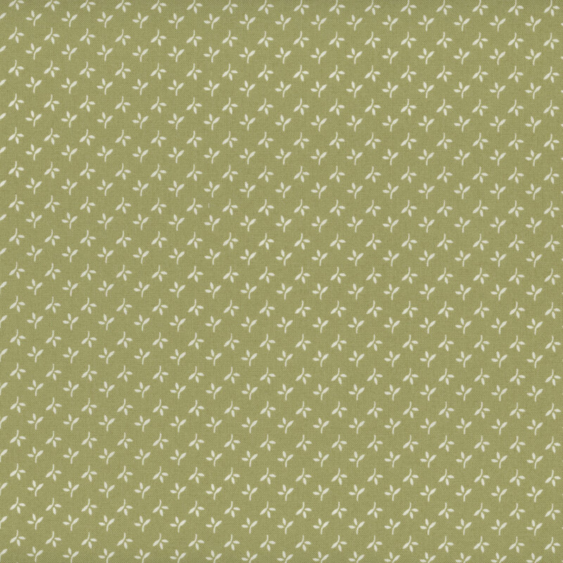 Swatch of green fabric with alternating rows of white leaves