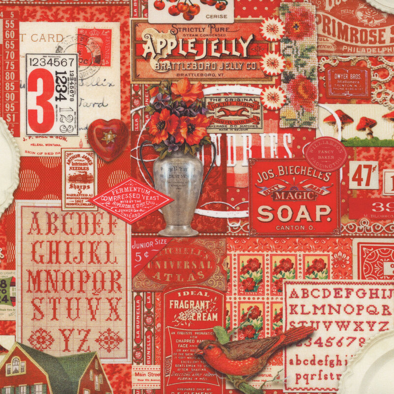 packed red fabric that featuring tonal red vintage labels, photos, and objects