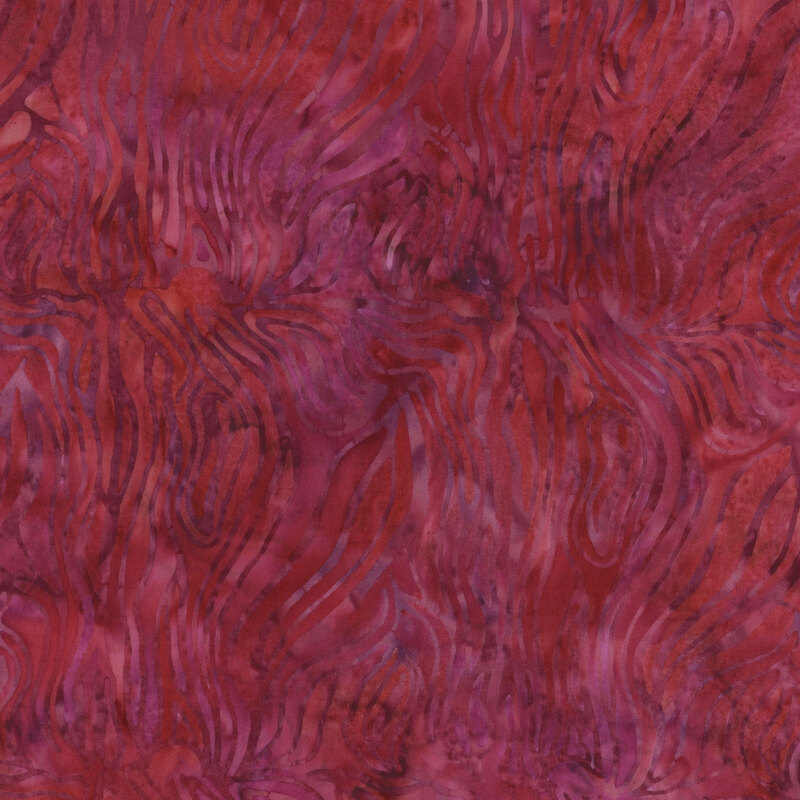 Dark red and purple zebra striped patterned fabric.