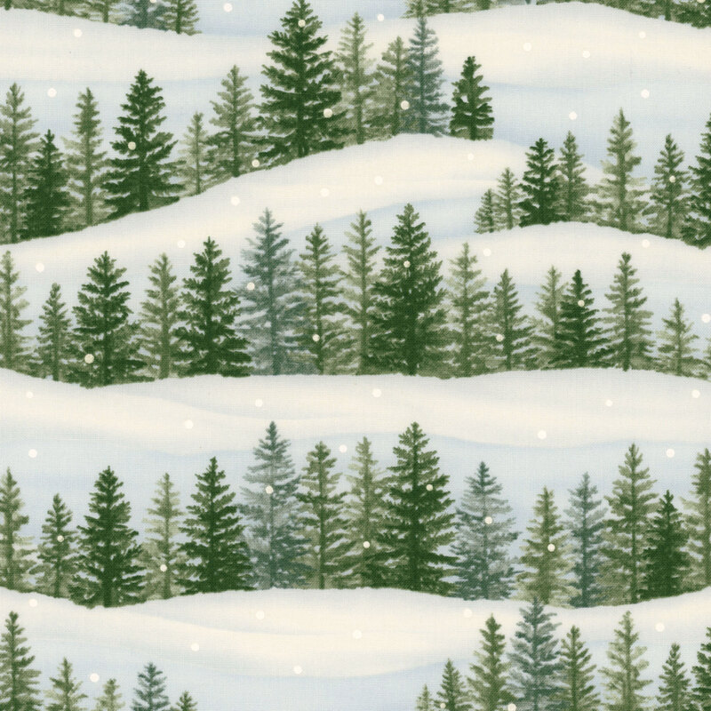 snowy blue woodland forest fabric featuring many trees and lots of snow