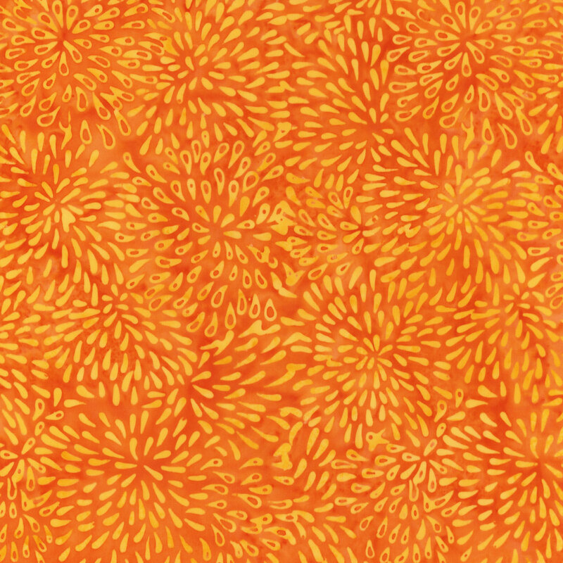 Orange fabric with yellow bursts 