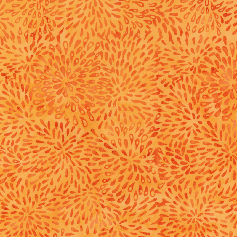 Light orange fabric with darker orange bursts.