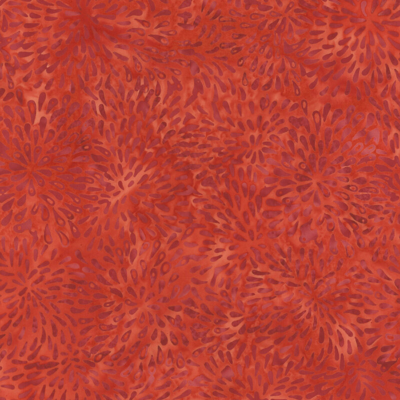 Red fabric with dark red bursts.